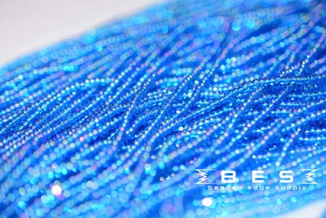 11/0 TR Drk Aqua AB | Charlotte Cut