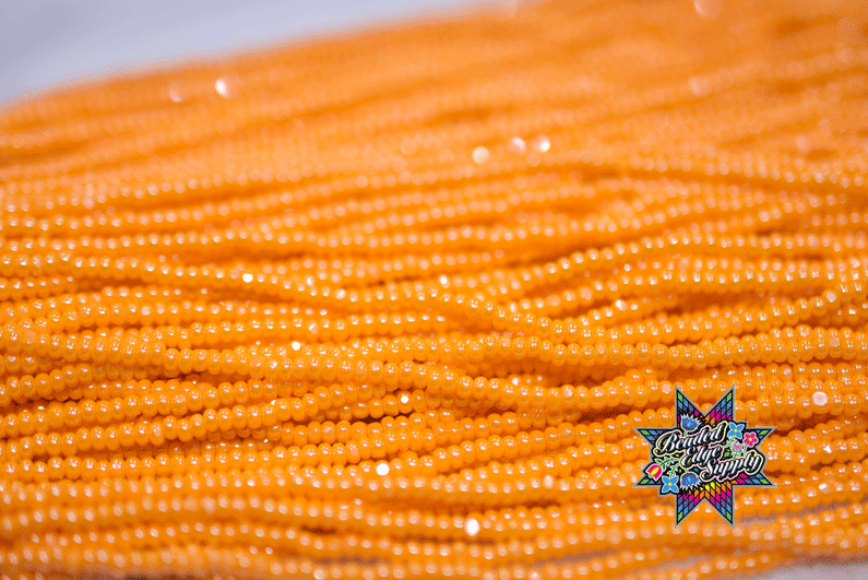 11/0 OP Lt Orange Luster | Charlotte Cut