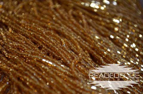 11/0 2 Cut SL Topaz (Gold)