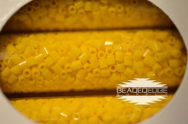 11/0 OP DRK Yellow 404a Hex