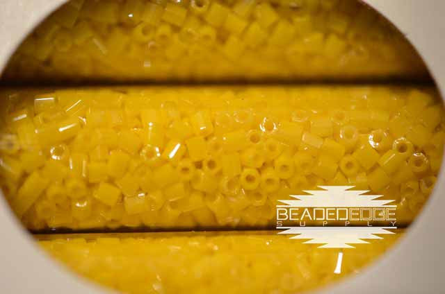 11/0 OP DRK Yellow Luster 422a Hex