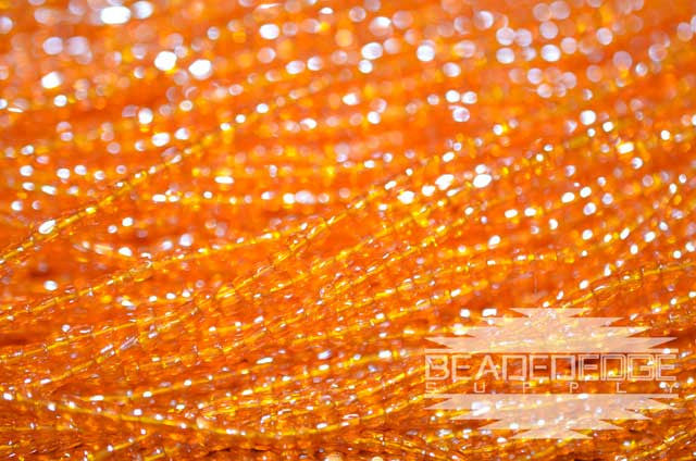 12/0 TR LT Orange/ Sun Luster | 3 cut