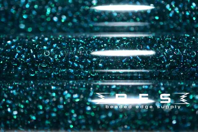 11/0 TR Emerald 323C JSB