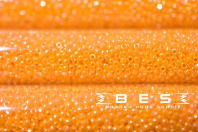 15/0 OP LT Orange Luster 423 3Cut