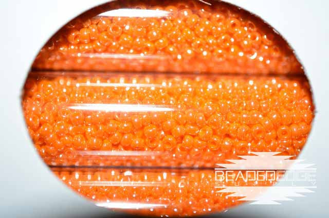 11/0 OP LT Orange Luster 423