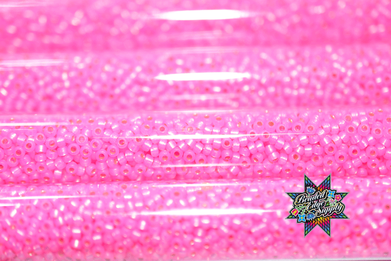 11/0 SL Alabaster Neon Pink 575
